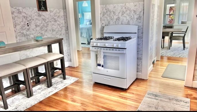 Dining room, Interior, Kitchen, Marble Walls, Stainless Steel Appliances, Wood Texture Flooring