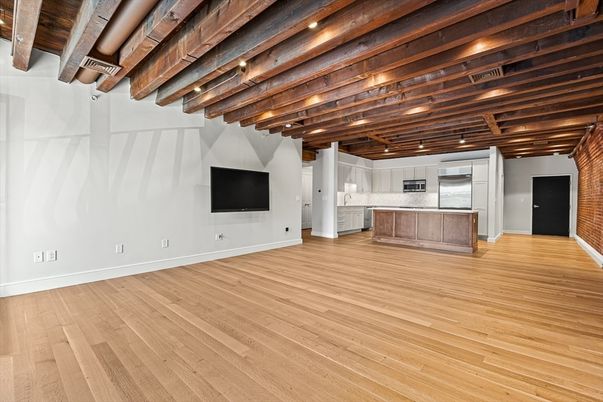 Empty room, Interior, Kitchen, Stainless Steel Appliances, Wooden Beams, Wood Texture Flooring