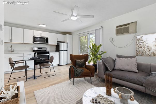 Dining room, Interior, Kitchen, Living room, Recessed Lighting, Stainless Steel Appliances, Wood Texture Flooring