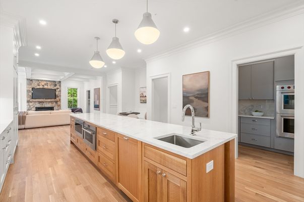 Fireplace, Interior, Kitchen, Living room, Pendant Lights, Recessed Lighting, Stainless Steel Appliances, Wood Texture Flooring