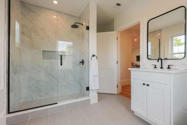 Bathroom, Glass Shower, Interior, Marble Walls, Recessed Lighting, Wood Texture Flooring