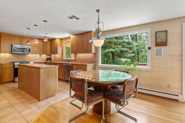 Dining room, Interior, Kitchen, Pendant Lights, Recessed Lighting, Stainless Steel Appliances, Wood Texture Flooring