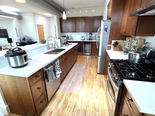 Interior, Kitchen, Pendant Lights, Tile Countertops, Wood Texture Flooring