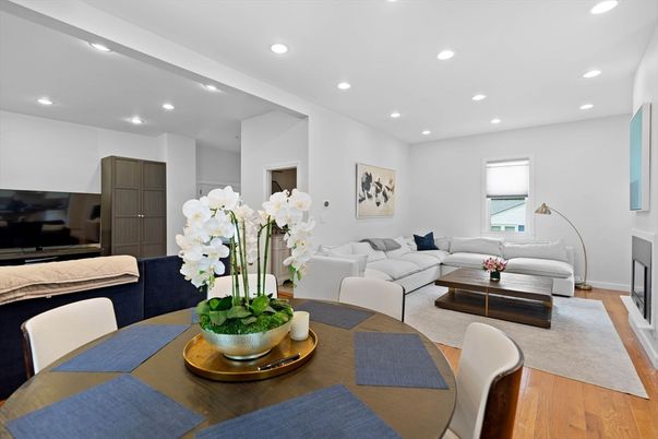 Dining room, Fireplace, Interior, Living room, Recessed Lighting, Wood Texture Flooring