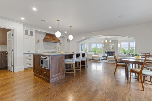Dining room, Fireplace, Interior, Kitchen, Living room, Pendant Lights, Recessed Lighting, Stainless Steel Appliances, Wood Texture Flooring