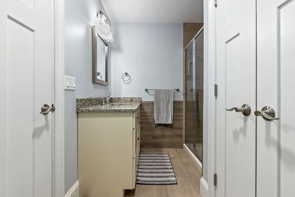 Bathroom, Glass Shower, Interior, Wood Texture Flooring