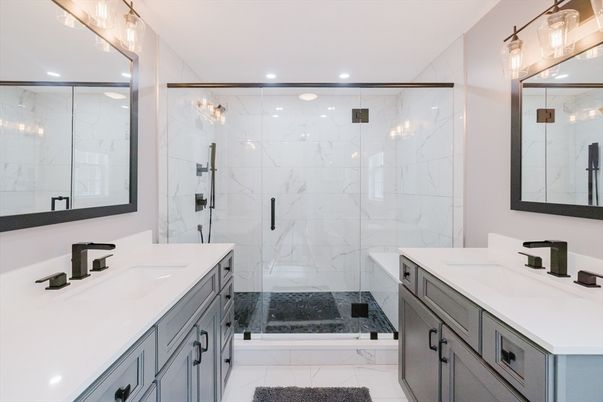 Bathroom, Dual Sink Vanities, Glass Shower, Interior, Marble, Marble Walls, Recessed Lighting
