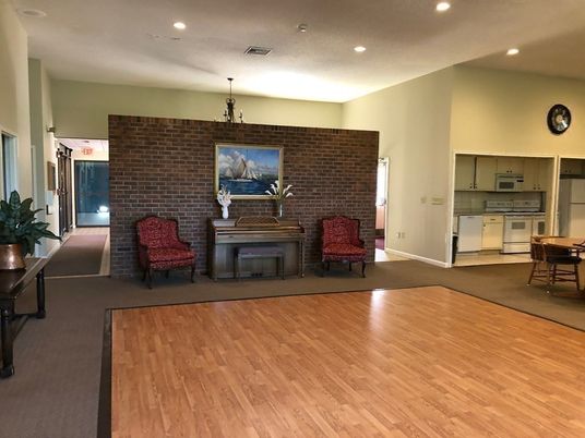 Dining room, Fireplace, Interior, Kitchen, Recessed Lighting, Stone Walls, Wood Texture Flooring