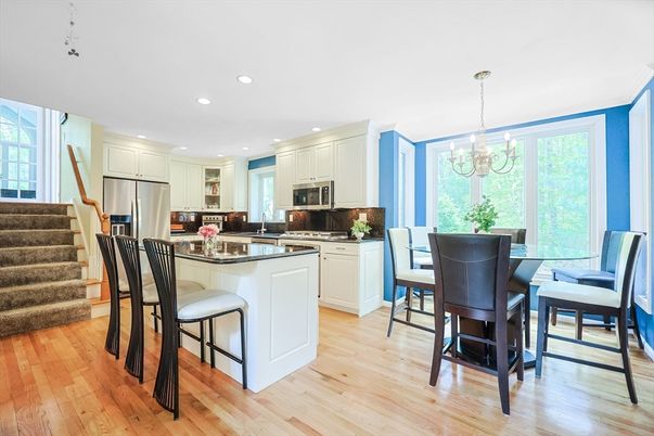 Chandelier, Dining room, Interior, Kitchen, Recessed Lighting, Stainless Steel Appliances, Wood Texture Flooring