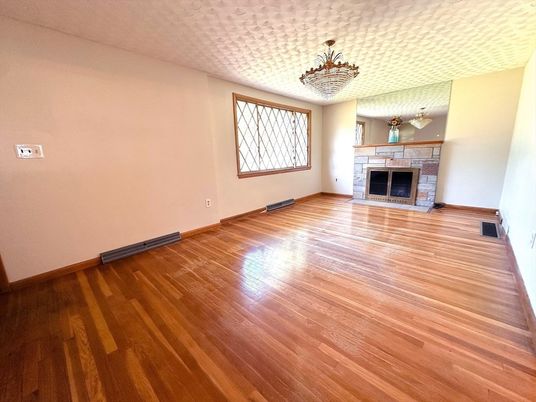 Chandelier, Empty room, Fireplace, Interior, Wood Texture Flooring
