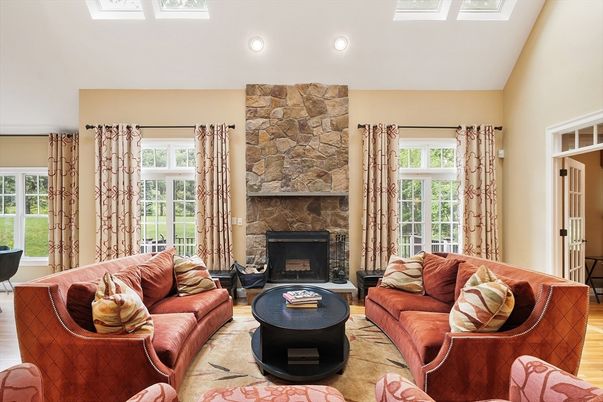 Fireplace, Interior, Living room, Recessed Lighting, Stone Walls, Wood Texture Flooring
