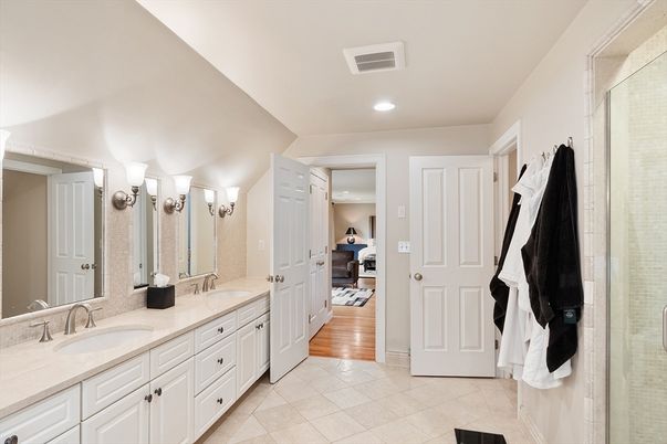 Bathroom, Dual Sink Vanities, Interior, Recessed Lighting, Wood Texture Flooring