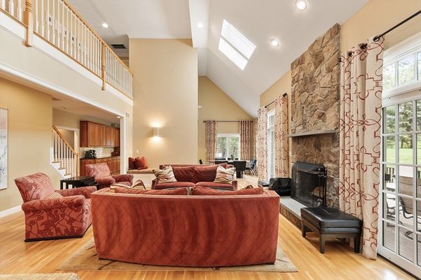 Fireplace, Interior, Living room, Recessed Lighting, Stone Walls, Wood Texture Flooring