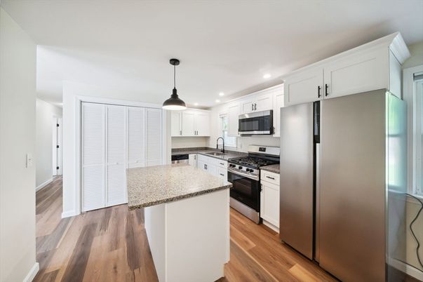 Interior, Kitchen, Pendant Lights, Recessed Lighting, Stainless Steel Appliances, Wood Texture Flooring