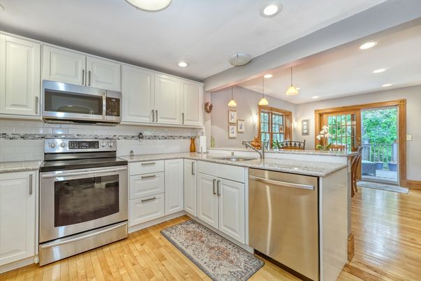 Interior, Kitchen, Pendant Lights, Recessed Lighting, Stainless Steel Appliances, Wood Texture Flooring