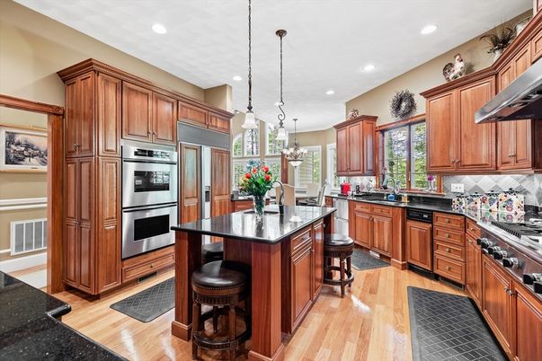 Chandelier, Dining room, Interior, Kitchen, Pendant Lights, Recessed Lighting, Stainless Steel Appliances, Wood Texture Flooring