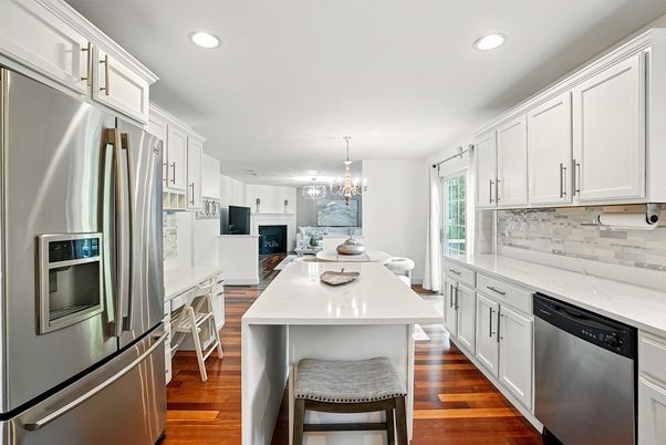 Chandelier, Dining room, Interior, Kitchen, Recessed Lighting, Stainless Steel Appliances, Wood Texture Flooring