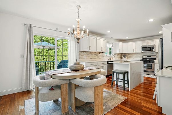 Chandelier, Dining room, Interior, Kitchen, Pendant Lights, Recessed Lighting, Stainless Steel Appliances, Wood Texture Flooring