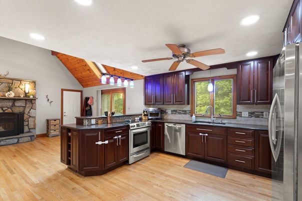 Fireplace, Interior, Kitchen, Recessed Lighting, Stainless Steel Appliances, Wooden Beams, Wooden Ceilings, Wood Texture Flooring