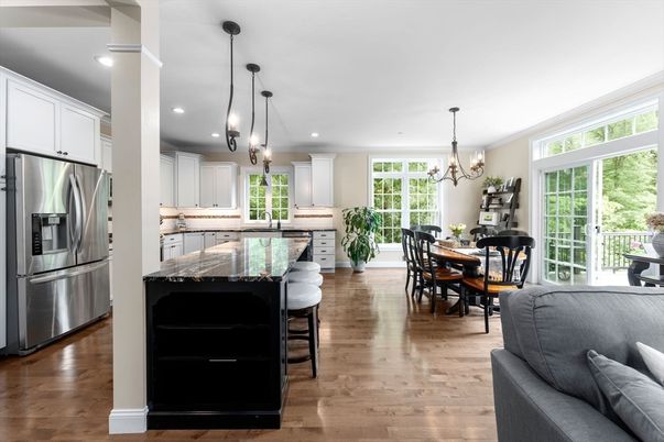 Chandelier, Dining room, Interior, Kitchen, Pendant Lights, Recessed Lighting, Stainless Steel Appliances, Wood Texture Flooring