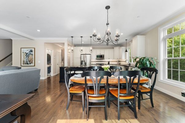 Chandelier, Dining room, Interior, Kitchen, Pendant Lights, Recessed Lighting, Stainless Steel Appliances, Wood Texture Flooring