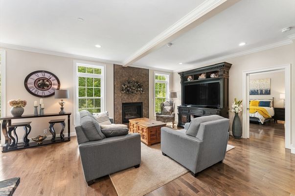 Fireplace, Interior, Living room, Recessed Lighting, Stone Walls, Wood Texture Flooring