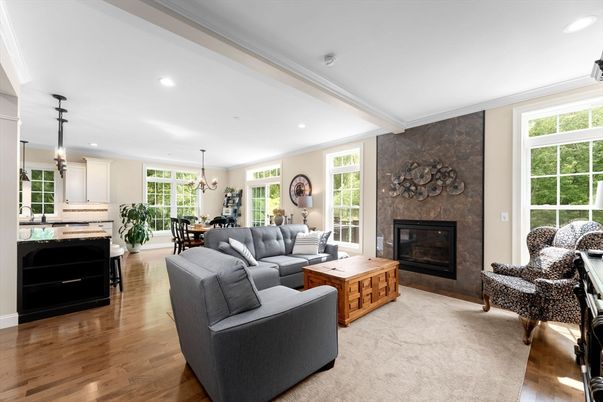 Chandelier, Dining room, Fireplace, Interior, Kitchen, Living room, Pendant Lights, Recessed Lighting, Stone Walls, Wood Texture Flooring