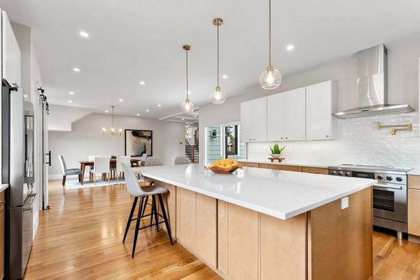 Chandelier, Dining room, Interior, Kitchen, Pendant Lights, Recessed Lighting, Stainless Steel Appliances, Wood Texture Flooring