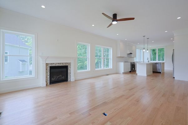 Empty room, Fireplace, Interior, Kitchen, Pendant Lights, Recessed Lighting, Wood Texture Flooring