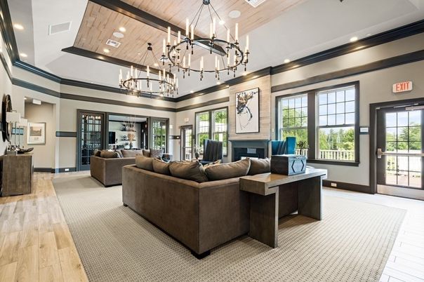 Chandelier, Fireplace, Interior, Living room, Pendant Lights, Recessed Lighting, Wooden Ceilings, Wood Texture Flooring