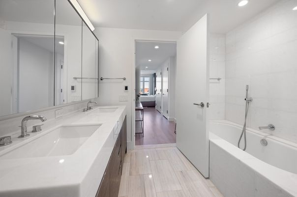 Bathroom, Dual Sink Vanities, Interior, Recessed Lighting, Wood Texture Flooring
