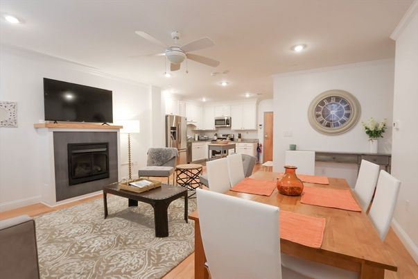 Dining room, Fireplace, Interior, Kitchen, Living room, Recessed Lighting, Stainless Steel Appliances, Wood Texture Flooring