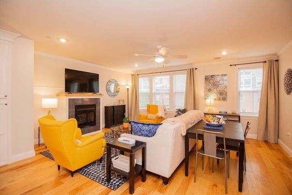 Dining room, Fireplace, Interior, Living room, Recessed Lighting, Wood Texture Flooring