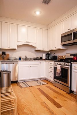 Interior, Kitchen, Recessed Lighting, Stainless Steel Appliances, Wood Texture Flooring