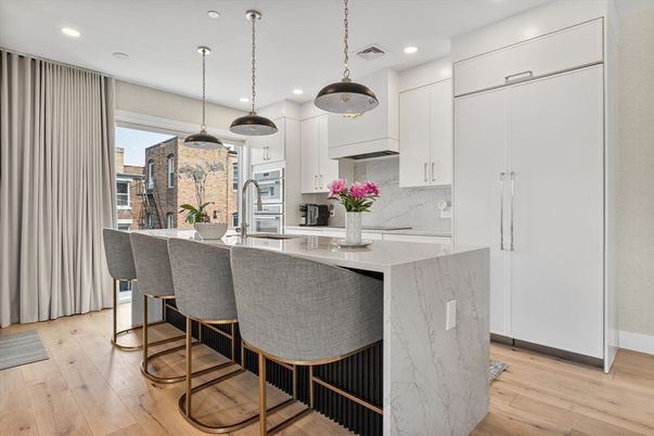 Interior, Kitchen, Marble Walls, Pendant Lights, Recessed Lighting, Stainless Steel Appliances, Wood Texture Flooring