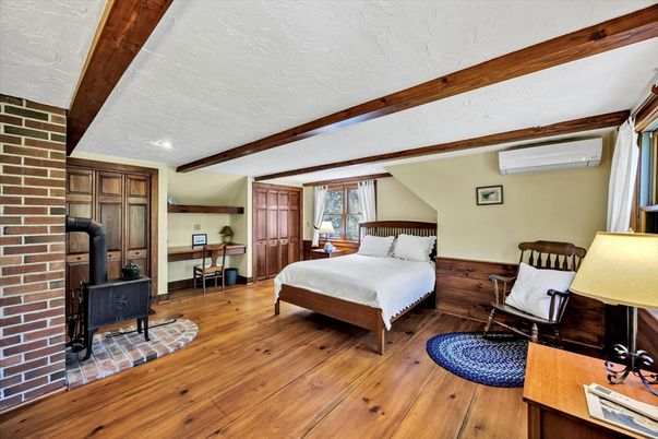 Bedroom, Fireplace, Interior, Stone Walls, Wooden Beams, Wood Texture Flooring
