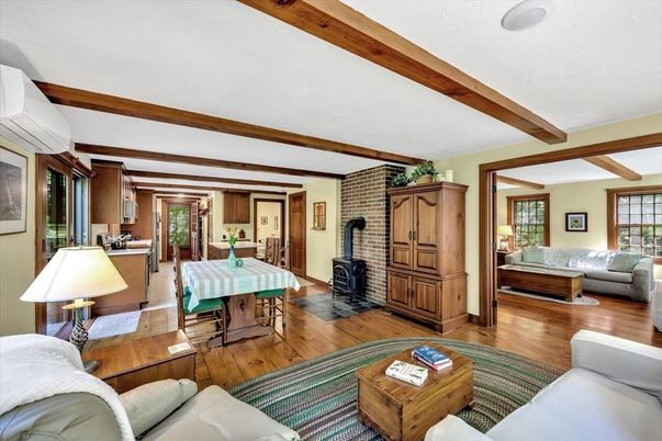 Dining room, Fireplace, Interior, Living room, Stone Walls, Wooden Beams, Wood Texture Flooring