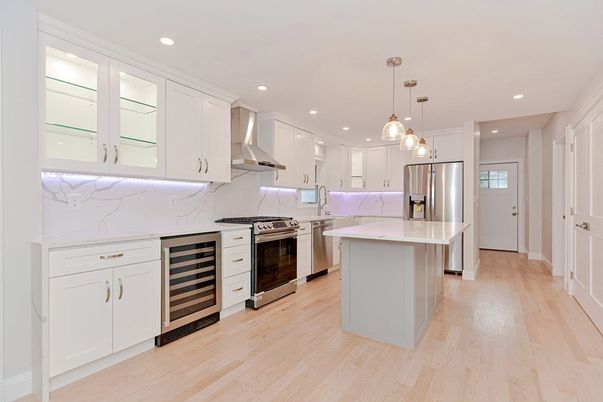Interior, Kitchen, Marble Walls, Pendant Lights, Recessed Lighting, Stainless Steel Appliances, Wood Texture Flooring