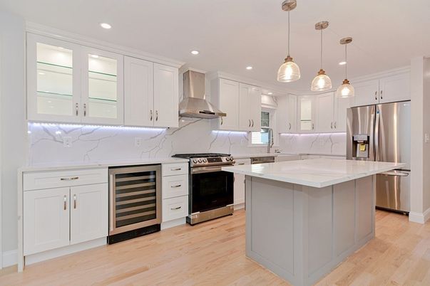 Interior, Kitchen, Marble Walls, Pendant Lights, Recessed Lighting, Stainless Steel Appliances, Wood Texture Flooring