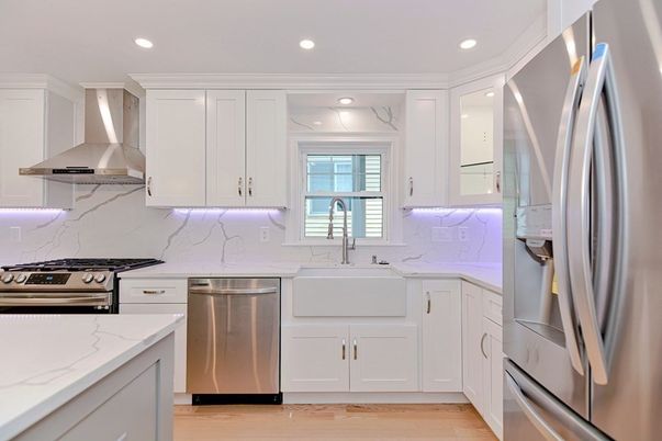 Interior, Kitchen, Marble Walls, Recessed Lighting, Stainless Steel Appliances, Wood Texture Flooring