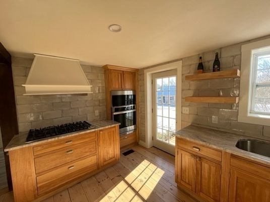 Interior, Kitchen, Recessed Lighting, Stainless Steel Appliances, Stone Walls, Wood Texture Flooring