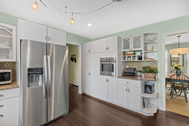 Dining room, Interior, Kitchen, Pendant Lights, Recessed Lighting, Stainless Steel Appliances, Wood Texture Flooring