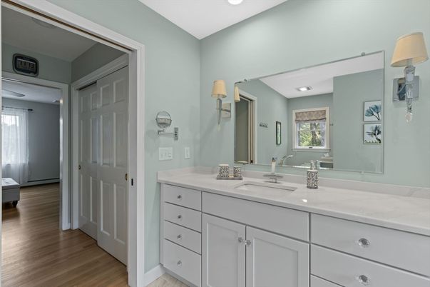 Bathroom, Dual Sink Vanities, Interior, Recessed Lighting, Wood Texture Flooring