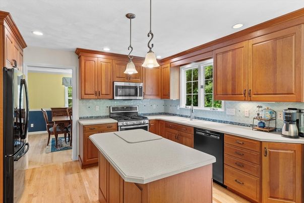 Chandelier, Dining room, Interior, Kitchen, Pendant Lights, Recessed Lighting, Stainless Steel Appliances, Wood Texture Flooring