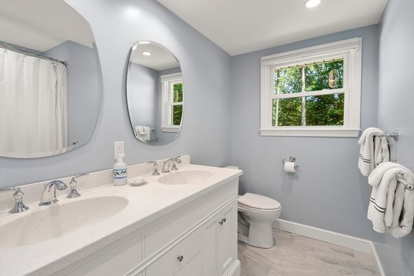 Bathroom, Dual Sink Vanities, Interior, Recessed Lighting, Wood Texture Flooring