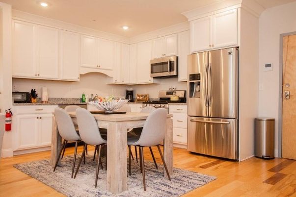 Dining room, Interior, Kitchen, Recessed Lighting, Stainless Steel Appliances, Wood Texture Flooring