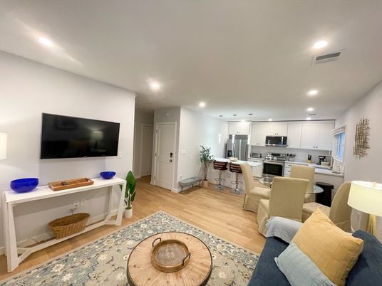 Dining room, Interior, Kitchen, Living room, Recessed Lighting, Stainless Steel Appliances, Wood Texture Flooring