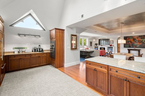 Dining room, Interior, Kitchen, Living room, Pendant Lights, Recessed Lighting, Stainless Steel Appliances, Wooden Ceilings, Wood Texture Flooring