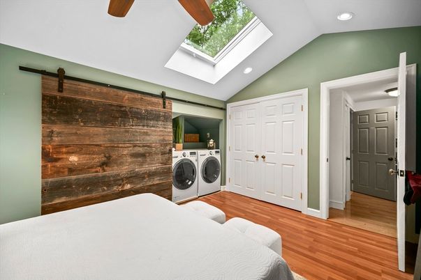 Bedroom, Interior, Recessed Lighting, Washer, Wood Texture Flooring, Wooden Walls