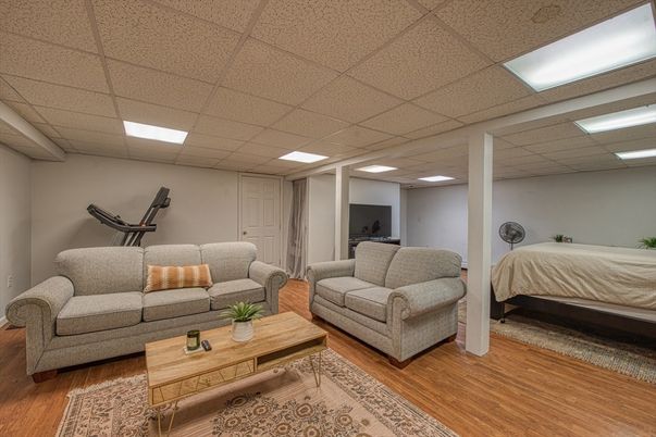Bedroom, Fitness Equipment, Interior, Living room, Recessed Lighting, Wood Texture Flooring